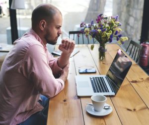 Freelancer planning local search marketing at a laptop