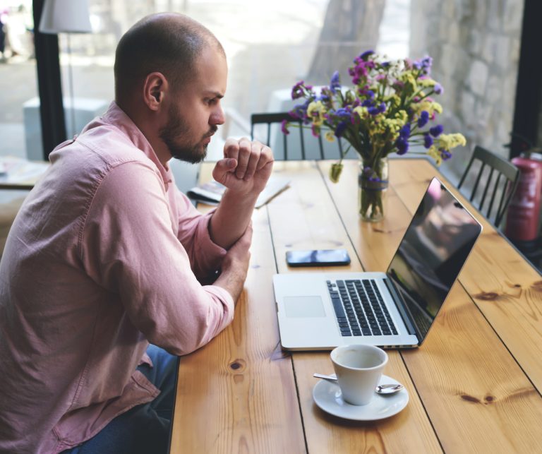 Freelancer planning local search marketing at a laptop